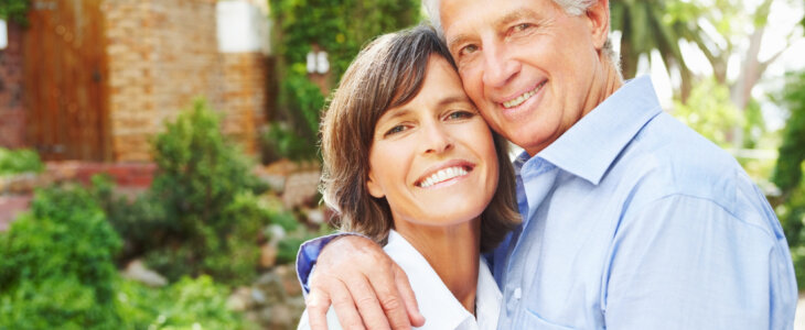 Portrait of a romantic mature couple smiling